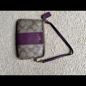 Coach wristlet, brown with purple, gold accents, gently used,